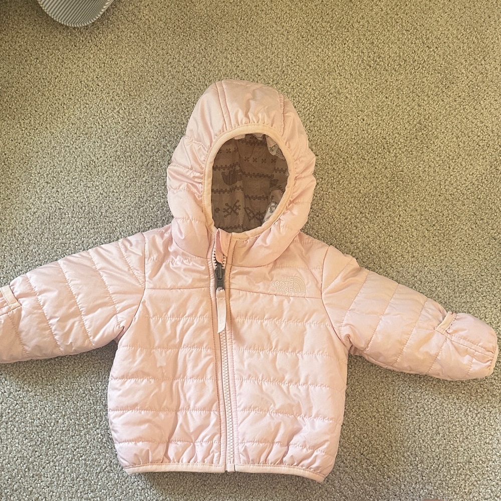 Pink Hooded Puffer Jacket; The North Face. Reversible baby girl puffer jacket.